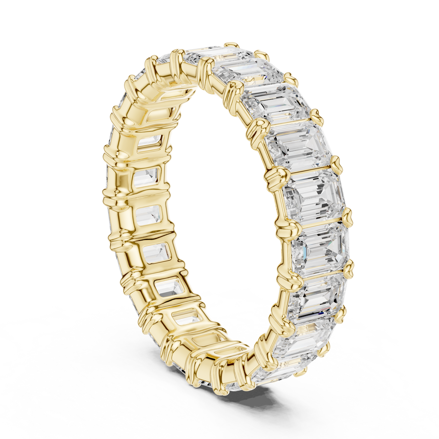 Emerald-Cut Eternity Ring — 3CT Design — digital render in a yellow metal tone